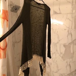 Green long-sleeve cardigan with white crochet